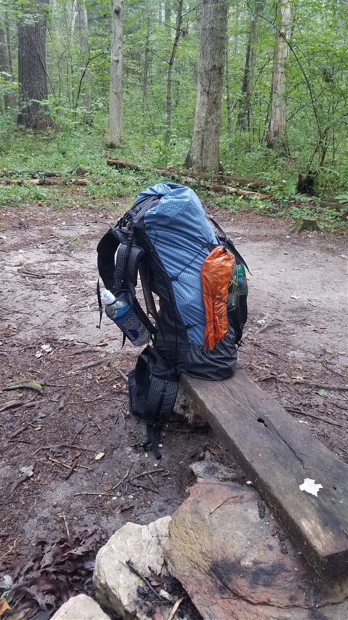 A full backpack ready to go...just waiting on the hiker. Must be in privy!